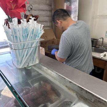 Makaha Chop Suey - Uncle chopping up the pork by the pound - Chinese Near Me - Waianae, Hawaii Makaha Chop Suey - Uncle chopping up the pork by the pound - Chinese Near Me - Waianae, Hawaii