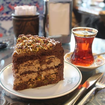Hafiz Mustafa - Chocolate and pistachio cake with a steaming cup of çay - Desserts Near Me - Istanbul, 34 Hafiz Mustafa - Chocolate and pistachio cake with a steaming cup of çay - Desserts Near Me - Istanbul, 34