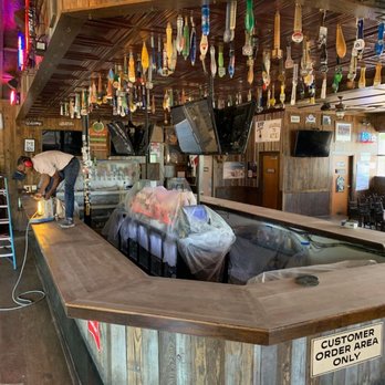 The Floorman - Sanding of a 78ft bar top. - General Contractors Near Me The Floorman - Sanding of a 78ft bar top. - General Contractors Near Me