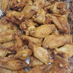 La Esquina - Chicken wings. Plain or sauced.