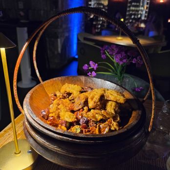 Hutong - RED LANTERN  65  Red Lantern Hutong's signature crispy spiced soft-shell crab on a bed of dried whole chilies - Chinese Near Me - Miami, Florida