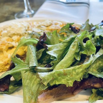 Roots & Revelry - Gulf Omelette with dressed greens! - Bars Near Me - Birmingham, Alabama