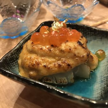 Octopus Garden - Close up of the torched scallop motoyaki with uni sauce, imitation, and gold flakes - Japanese Near Me - Vancouver, British Columbia