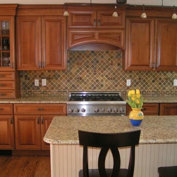 T & M Kitchens - a kitchen with a center island - General Contractors Near Me - Kinnelon, New Jersey T & M Kitchens - a kitchen with a center island - General Contractors Near Me - Kinnelon, New Jersey