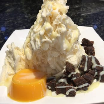 Nu Ice & Drinks - Sea Salt Caramel ice with flan, brownie bites, and condensed milk. - Desserts Near Me - Houston, Texas Nu Ice & Drinks - Sea Salt Caramel ice with flan, brownie bites, and condensed milk. - Desserts Near Me - Houston, Texas