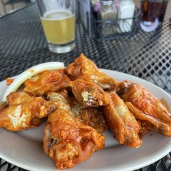 Town Square Pub N Grub - Hot wings.  Tender, juicy and perfect heat.  Ask for extra done.  City Wide in background for size reference.  Banana had day off.