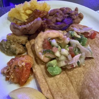 Chevys - Plate #2 Shrimp ceviche tostada. Notice the second helping of the sweet corn pudding. Can't get enough. - Mexican Near Me - Fairfield, California Chevys - Plate #2 Shrimp ceviche tostada. Notice the second helping of the sweet corn pudding. Can't get enough. - Mexican Near Me - Fairfield, California