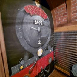 a steam engine painted on a wall a steam engine painted on a wall
