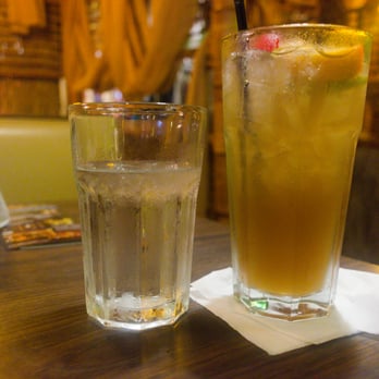 Chef Shangri-La - small glass of water and large Mai Tai - Chinese Near Me - North Riverside, Illinois Chef Shangri-La - small glass of water and large Mai Tai - Chinese Near Me - North Riverside, Illinois
