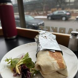 The Jefferson Market - Breakfast Burrito - Grilled flour tortilla filled with scrambled Grazing Fields eggs, jack cheese, black beans with onions and pepper.