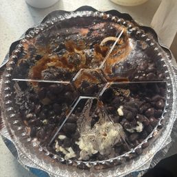 Chicken enchiladas w mole and black beens sorry I dropped while in bag house down sosososos Delicious Chicken enchiladas w mole and black beens sorry I dropped while in bag house down sosososos Delicious