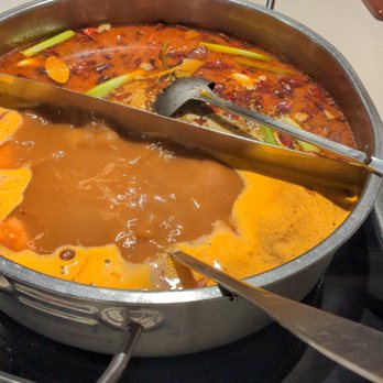 Happy Lamb Hot Pot - Tomato broth and spicy broth - Chinese Near Me - Flushing, New York Happy Lamb Hot Pot - Tomato broth and spicy broth - Chinese Near Me - Flushing, New York
