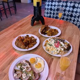 Avocado Toast, Carne Asada Chilaquiles, Cry Baby Breakfast Burger and Mimosa Tower