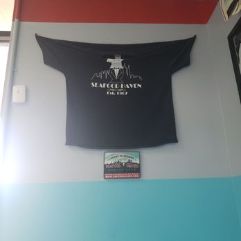 Seafood Haven - a t - shirt hanging on a wall - Seafood Near Me - Willingboro, New Jersey