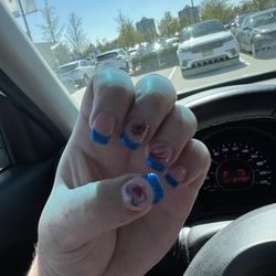 Envy Nails - I brought the hockey stickers. She did the tips and design!