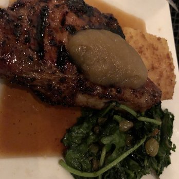 Paseo Grill - Terrible picture of the pork chop with scallop potatoes and kale - American Near Me - Oklahoma City, Oklahoma Paseo Grill - Terrible picture of the pork chop with scallop potatoes and kale - American Near Me - Oklahoma City, Oklahoma