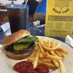 Quarter Pounder Hamburger with French fries and an Iced Tea. Quarter Pounder Hamburger with French fries and an Iced Tea.