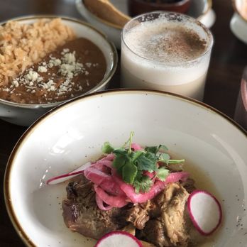 Amano - Carnitas Michoacán, served with frijoles puercos (ah-mazing) The pork is fantastic! - Cocktail Bars Near Me - Caldwell, Idaho