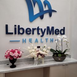 LibertyMed Health Group - Beautiful front desk area in their new office!