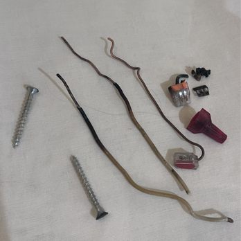 Light Source Electric - Burnt wires, cap and 2 inch screws that held the box in place - Electricians Near Me - Pennsauken, New Jersey Light Source Electric - Burnt wires, cap and 2 inch screws that held the box in place - Electricians Near Me - Pennsauken, New Jersey