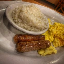 The Club House Restaurant - Big Breakfast- Scrambled eggs, grits & sausage links