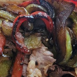Tino's Carry Out - Tino's Italian beef with sauteed sweet peppers. Meaty, plentiful, juicy, can hold its own against Portillios anyday.