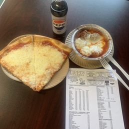 Two slices extra cheese with a side of meatballs Two slices extra cheese with a side of meatballs