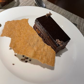 Bludorn - Chocolate layer cake with vanilla bean ice cream - New American Near Me - Houston, Texas