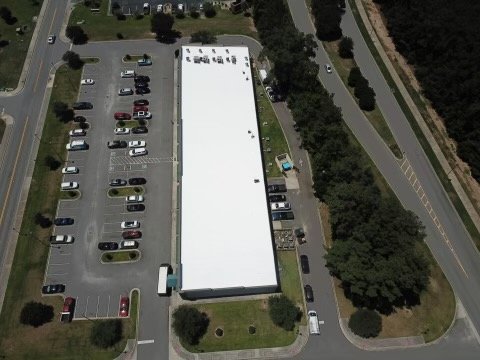 Slide of LandShark Roofing