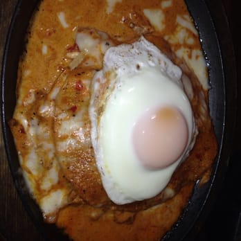 Jack Allen's Kitchen - Flat iron layered chicken enchiladas with ranchero cream sauce! AMAZING - Southern Near Me - Round Rock, Texas