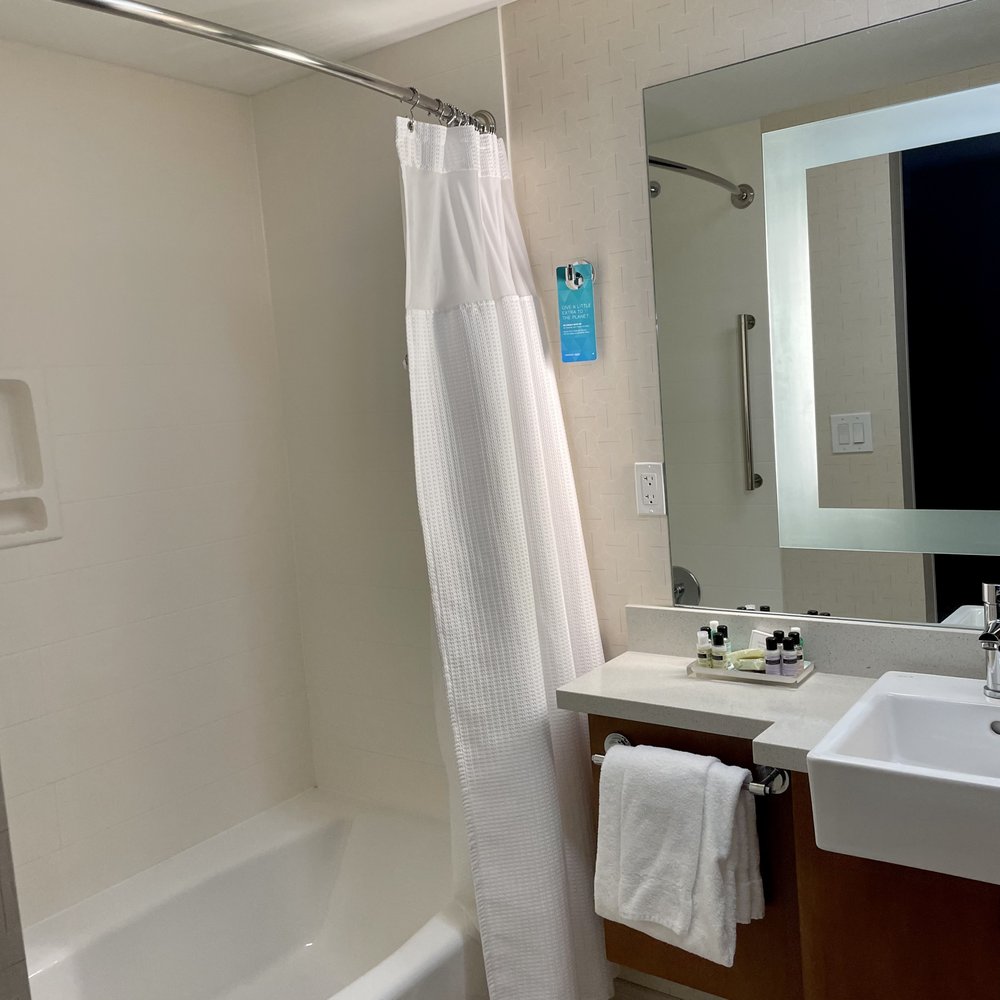 SpringHill Suites Canton - Large bathroom behind the sliding door - Hotels Near Me - North Canton, Ohio SpringHill Suites Canton - Large bathroom behind the sliding door - Hotels Near Me - North Canton, Ohio