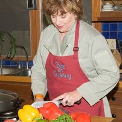 Rosie making magic for her clients in the kitchen!