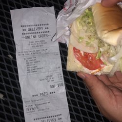 Jimmy John's - I get that I add some ingredients, but when I ask for no tomatoes. I mean I don't like tomatoes. Once again, an uncut sammy.
