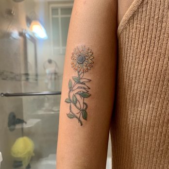 Jacob The Tattoo Guy - Sunflower wrapped around hand(ignore the blood lol) - Tattoo Near Me - Long Beach, California