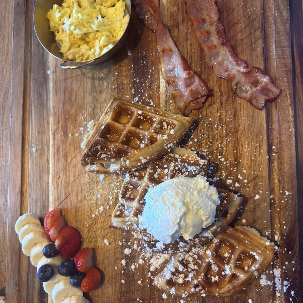 El Encanto - 1/2 waffles platter with bacon and scrambled eggs. - Breakfast & Brunch Near Me - San Diego, California El Encanto - 1/2 waffles platter with bacon and scrambled eggs. - Breakfast & Brunch Near Me - San Diego, California