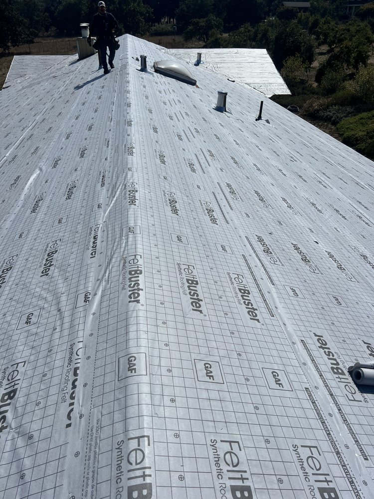 Slide of Palmer Roofing Service