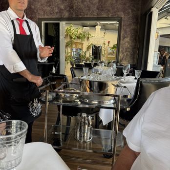 The Continental - Dirty martini cart with our server Tyson - Steakhouses Near Me - Naples, Florida The Continental - Dirty martini cart with our server Tyson - Steakhouses Near Me - Naples, Florida