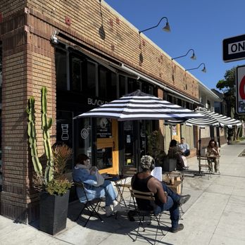 Black Dog Coffee Roasters - Street view Sidewalk tables - Coffee Roasteries Near Me - Long Beach, California