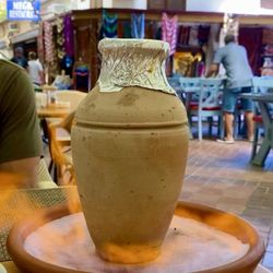 Meğri Restaurant - Clay pot at our table, lit up on fire