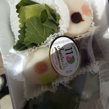 Fugetsu-Do - Neatly wrapped. The square one was the blueberry mochi, my favorite. - Candy Stores Near Me - Los Angeles, California