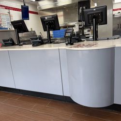 Domino's Pizza - Front counter with menu above