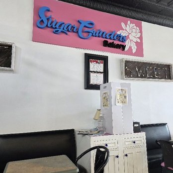 Sugar Grinders Creamery and Bakery - Cute name sign inside the shop - Desserts Near Me - Franklinton, North Carolina Sugar Grinders Creamery and Bakery - Cute name sign inside the shop - Desserts Near Me - Franklinton, North Carolina