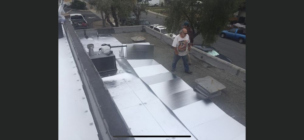 Slide of Riparetti Roofing