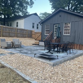Franko's Construction - Stone patio with gravel surrounding - Fences & Gates Near Me
