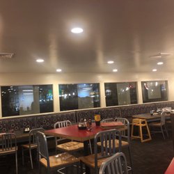 Pizza Hut - Theee TVs and the dining area. Very pleasant