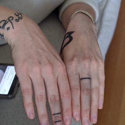 Apocalypse Tattoos - Finger touch ups by Stacy and Adam