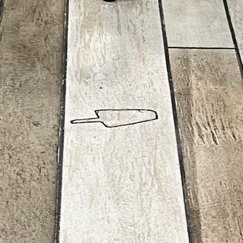 Baba Java - The Village at Meadowbrook - a drawing of a bottle of wine on the floor - Coffee & Tea Near Me - Birmingham, Alabama