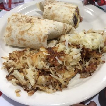 La Plazita - Smoked sausage breakfast burrito with hash browns - Mexican Near Me - Tyler, Texas