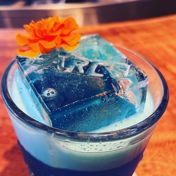 Earl’s - Kawehewehe cocktail: Kuleana nanea rum, smoked pineapple cordial, vanilla foam - Cocktail Bars Near Me - Honolulu, Hawaii