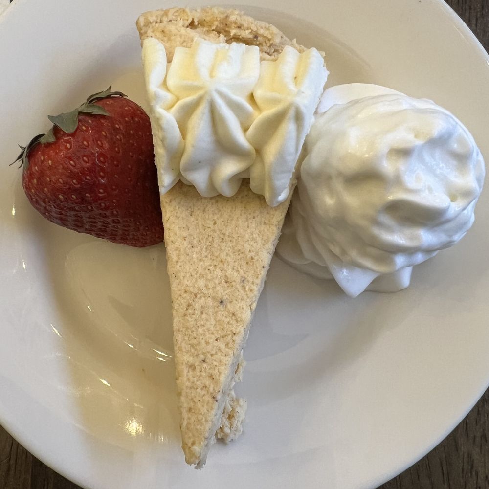 Pumpkin Cheesecake with whipped cream.